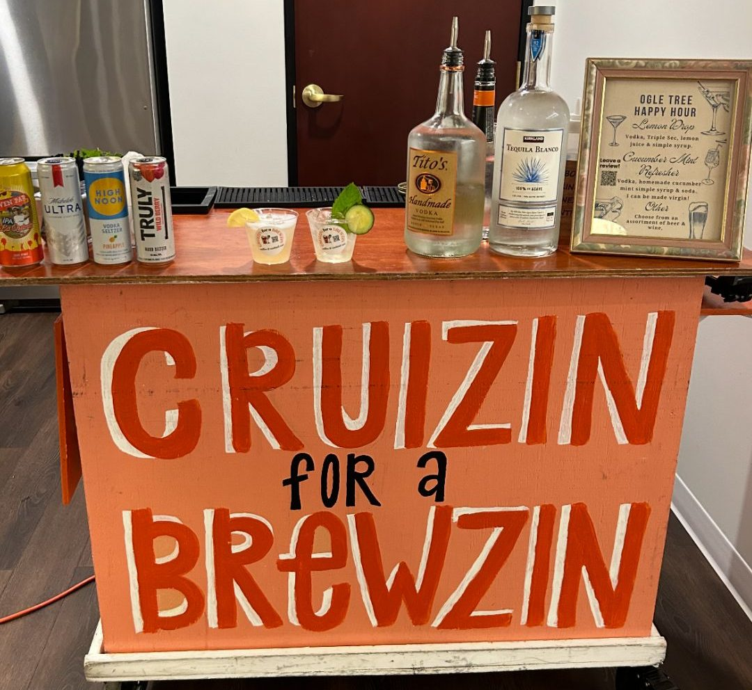 Mobile bar cart with Titos vodka and specialty cocktails