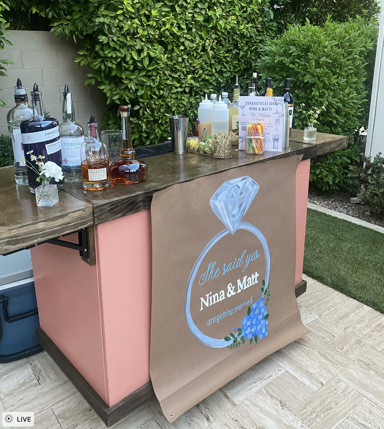 Custom engagement party bar with signage